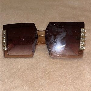 Elegant Brown Sunglasses with Gold Accents